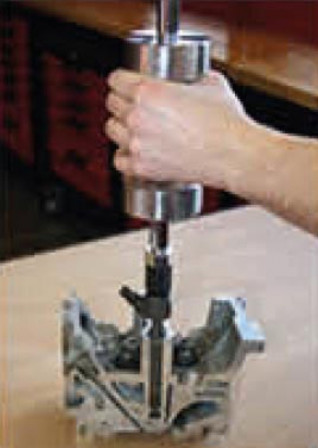 extacteur d'injecteur diesel avec masse à inertie